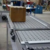 Omni Metalcraft Corp. Activated Roller Belt Aligning Conveyor