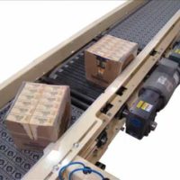 Omni Metalcraft Corp. Activated Roller Belt Conveyor with Retractable Bump Turn