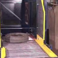 Omni Metalcraft Corp. Tire Handling Continuous Vertical Conveyor
